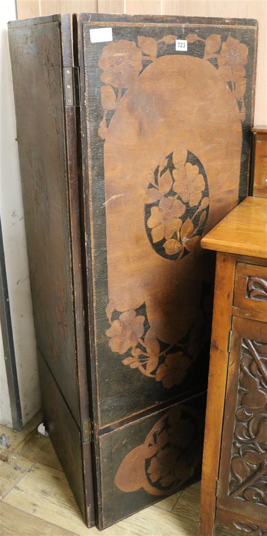 A stencil decorated two leaf screen, W.50cm